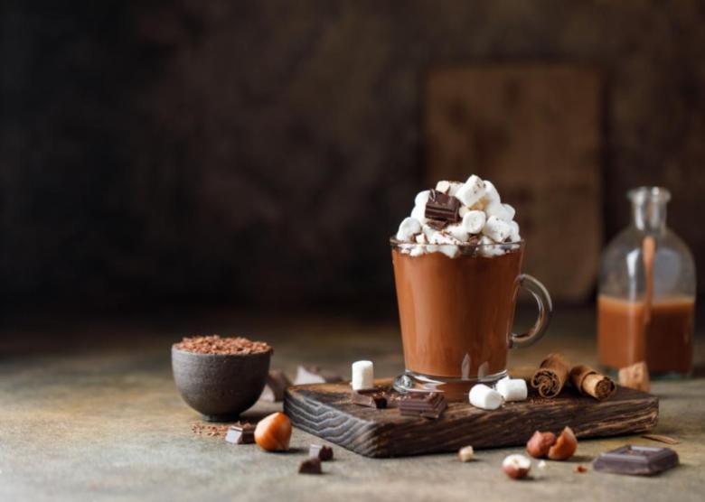 Alcohol-infused goodies, chocolate A chocoate Christmas drink in a glass mug.