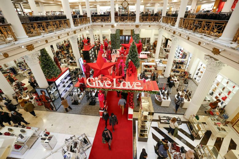 A big department store decked out for the holiday season in red and white colors.