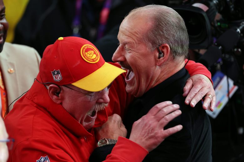 Kansas City Chiefs head coach Andy Reid hugs former NFL head coach Bill Cowher after his team defeated the San Francisco 49ers in Super Bowl LVIII.