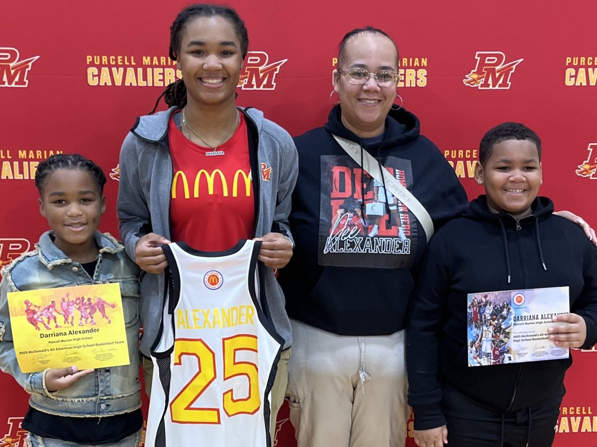 McDonald’s awards Dee Alexander an All American jersey