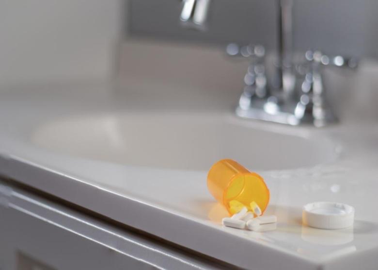 Medications Medications on a bathroom sink.